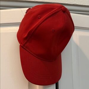 Burnt orange Lululemon baller hat